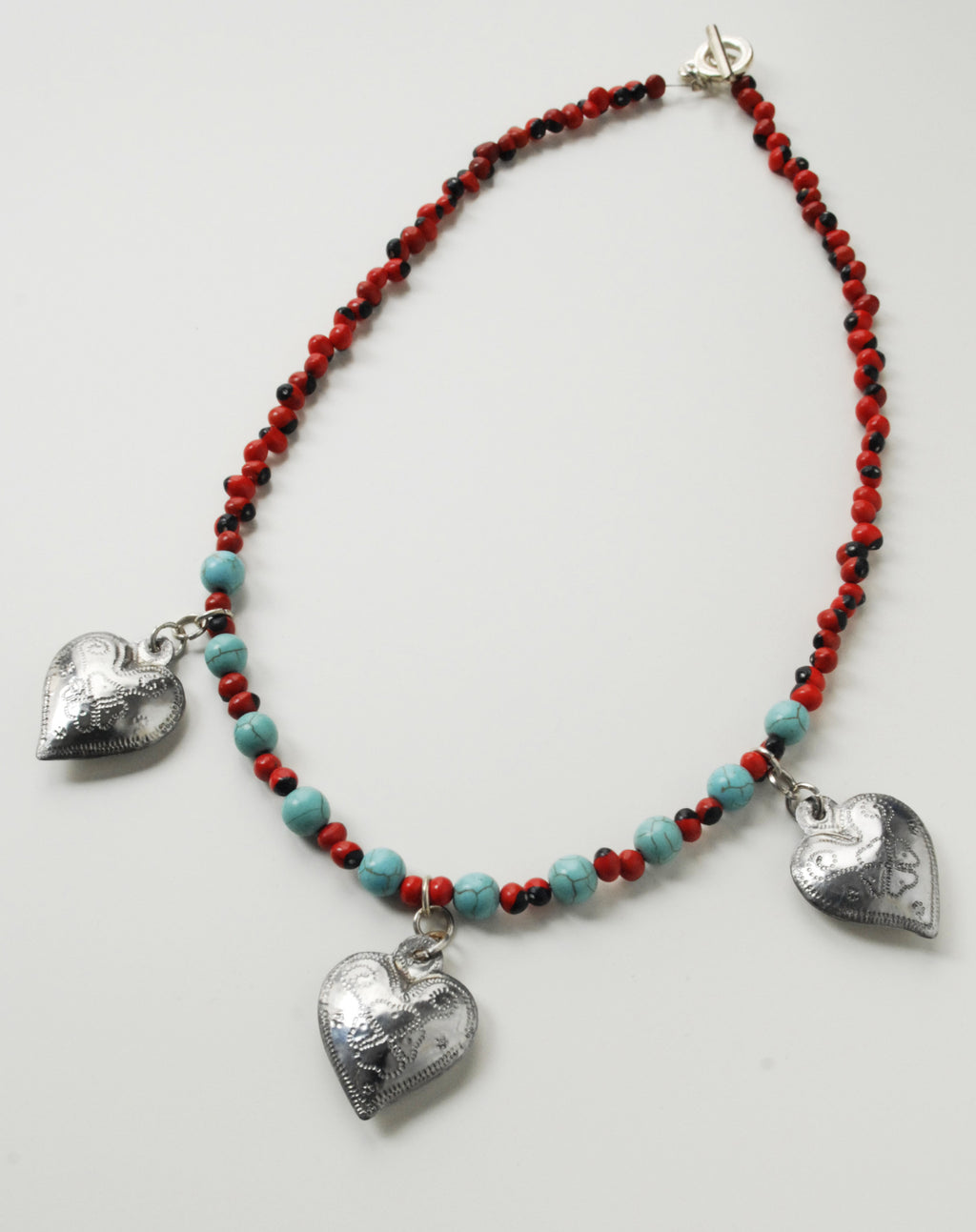 Handmade tin heart necklace with turquoise