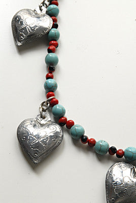 Handmade tin heart necklace with turquoise detail